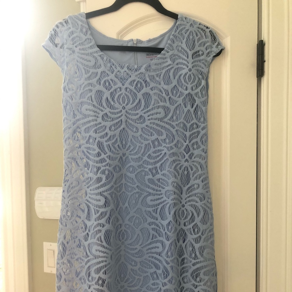Periwinkle blue miracle suit dress.